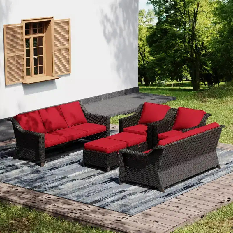 Ensemble de mobilier de jardin UPTIOT avec deux canapés, des chaises, des poufs et une table brasero pour des rassemblements spacieux