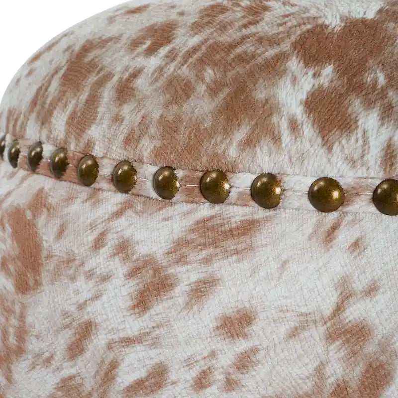 Repose-pieds pouf en similicuir de vache avec garniture cloutée, marron et blanc