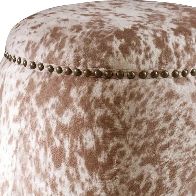 Repose-pieds pouf en similicuir de vache avec garniture cloutée, marron et blanc