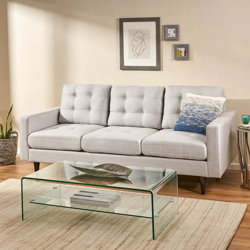 Canapé contemporain 3 places en tissu capitonné
