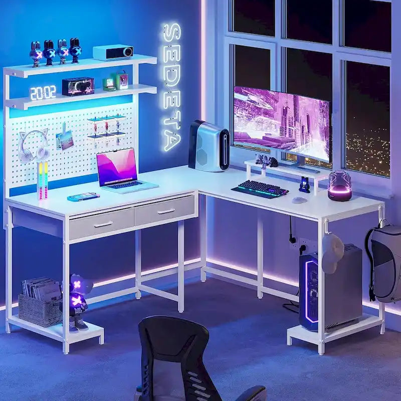 Bureau de jeu en L avec panneau perforé, tiroirs et support d'écran