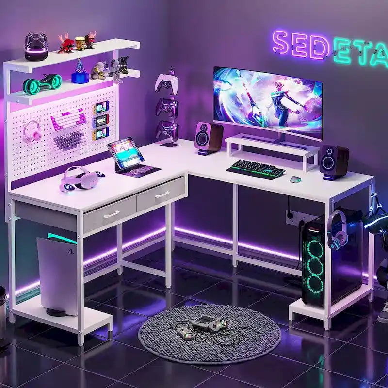 Bureau de jeu en L avec panneau perforé, tiroirs et support d'écran