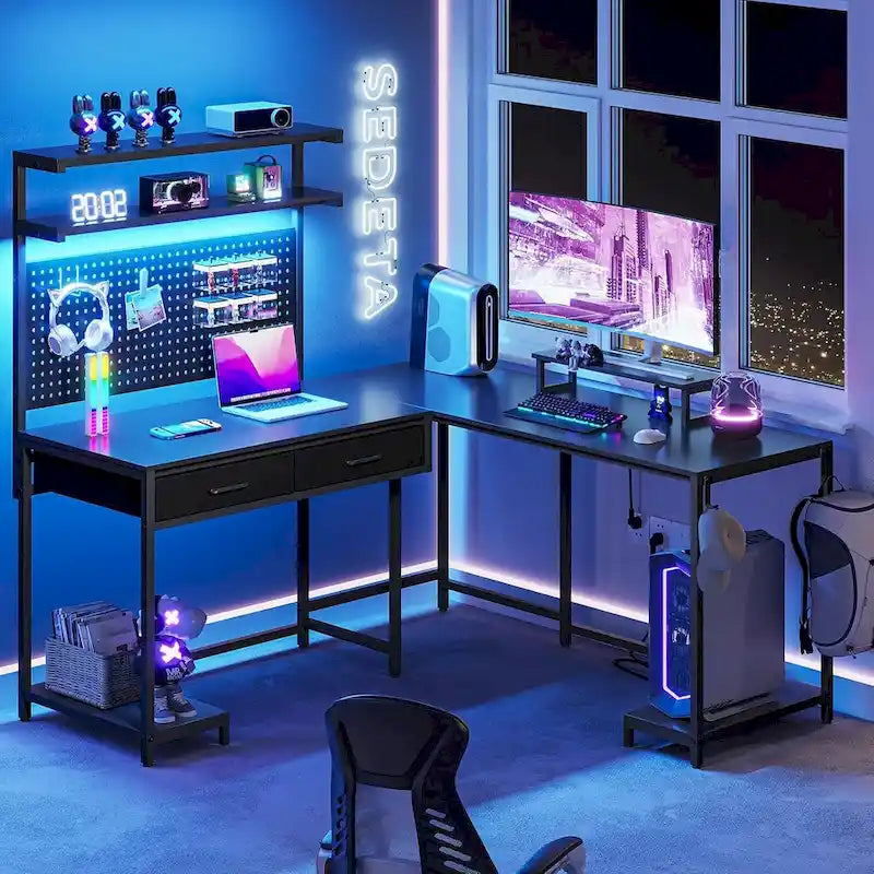 Bureau de jeu en L avec panneau perforé, tiroirs et support d'écran